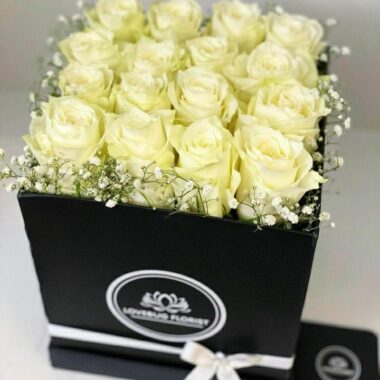 Scarlet Chateau, boxed flowers by Lovebug Florist Lagos