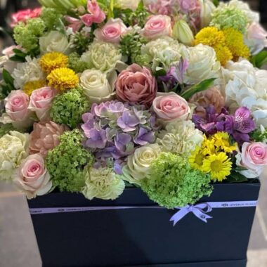 Golden Hatbox, boxed flowers by Lovebug Florist Lagos