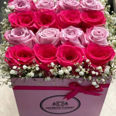 Golden Sovereign, boxed flowers by Lovebug Florist Lagos