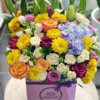 Golden Dynasty, boxed flowers by Lovebug Florist Lagos
