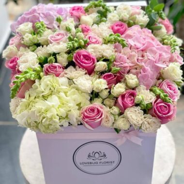 Golden Prestige, boxed flowers by Lovebug Florist Lagos