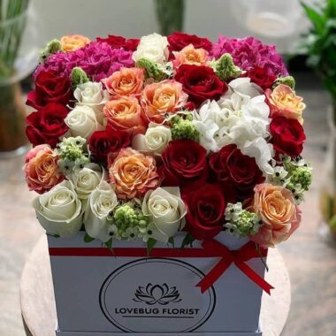 Crimson Manor, boxed flowers by Lovebug Florist Lagos