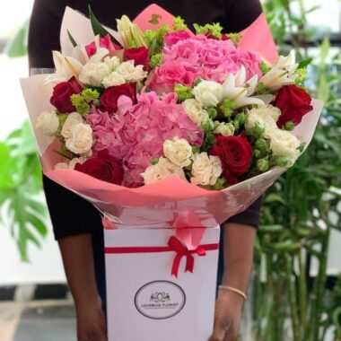 Golden Cascade, flower bouquet by Lovebug Florist Lagos