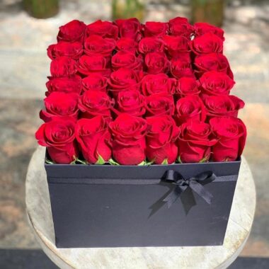 Rare Gem, Red, red rose arrangement by Lovebug Florist Lagos