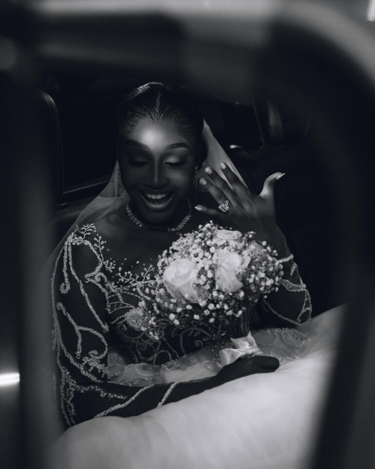 Bride in gown with cascading bridal bouquet